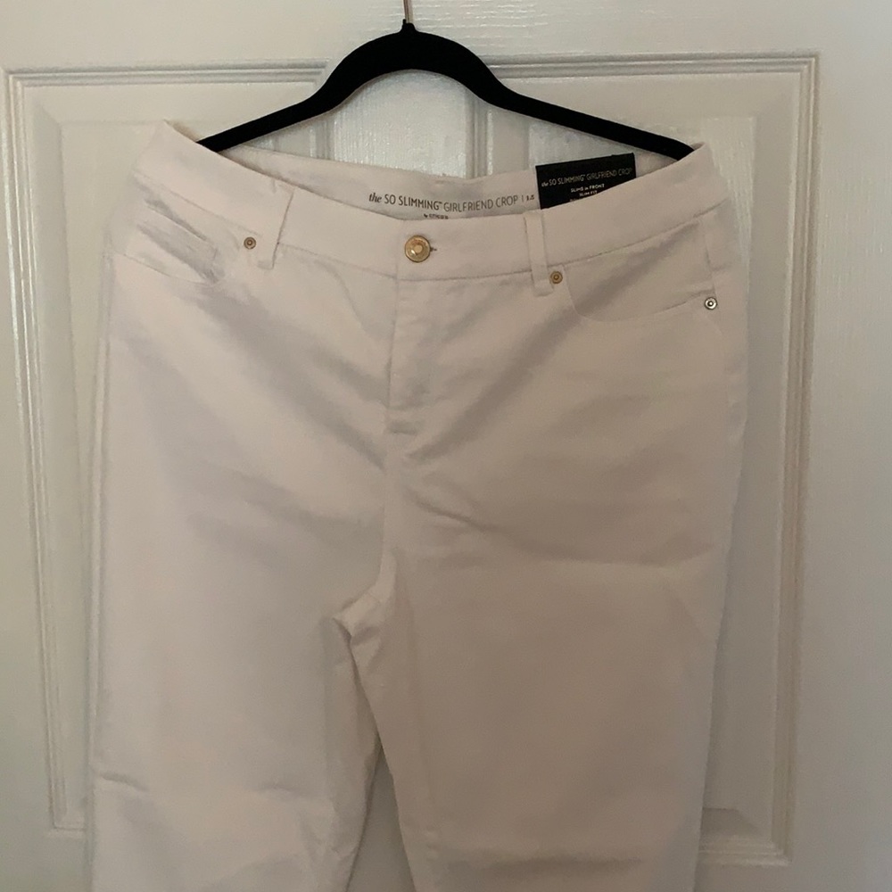 Chicos white so slimming girlfriend crop jeans.